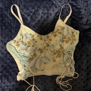 Mesh blue top with butterfly’s